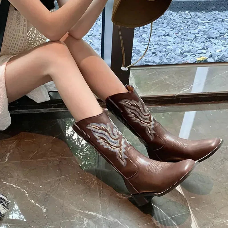 Women's retro mid-calf boots with a square toe and chunky heel.