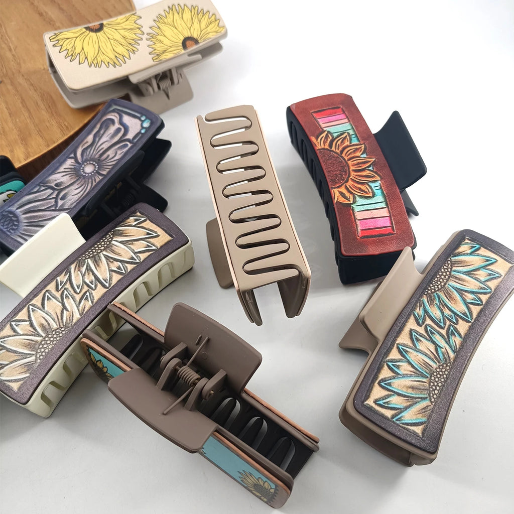 Large, cowboy-style PU leather hair clips with a sunflower print, non-slip grip.