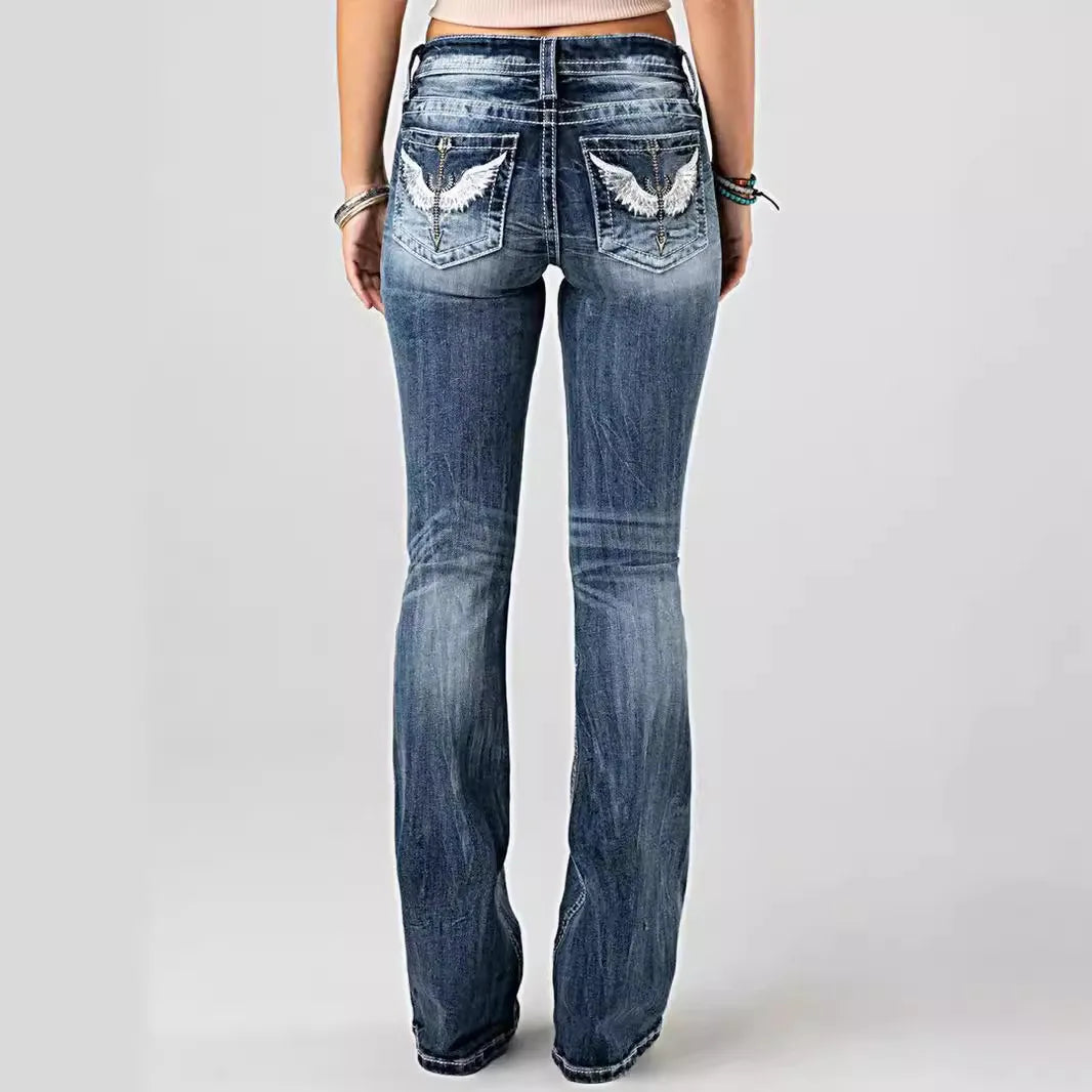 Women's jeans with embroidered pockets, distressed effect, mid-rise waist, slim fit, vintage style.