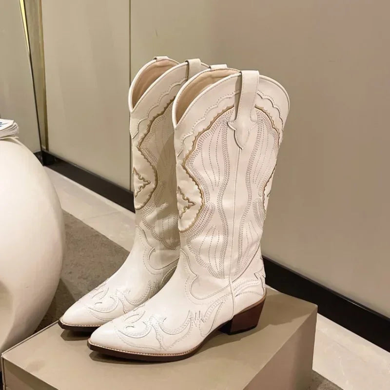 Women's vintage cowboy boot with square toe and chunky heel, embroidered, western style, with side zipper.
