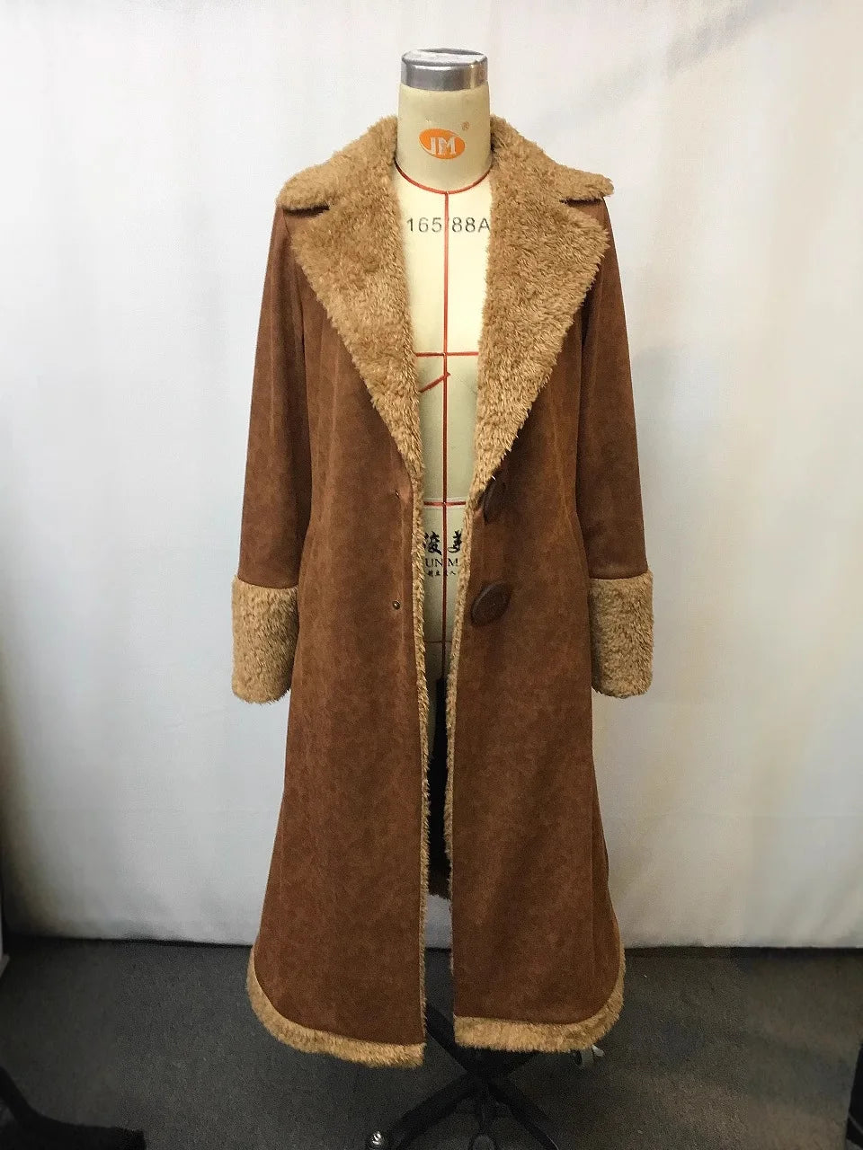 Women's vintage brown western-style denim jacket with plush lining.