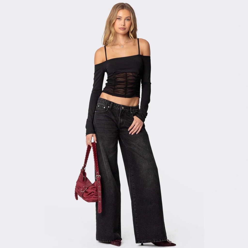 Women's wide-leg printed jeans, straight cut.
