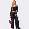 Women's wide-leg printed jeans, straight cut.