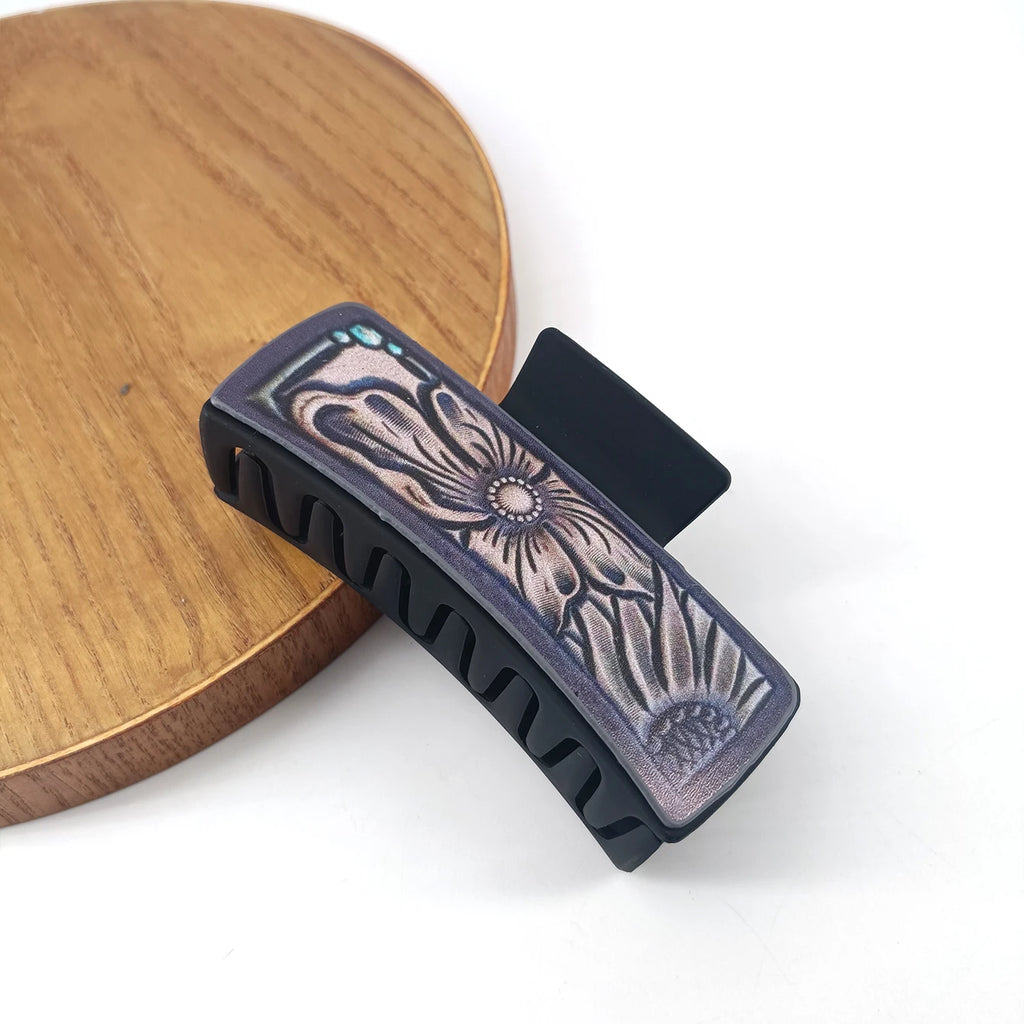Large, cowboy-style PU leather hair clips with a sunflower print, non-slip grip.