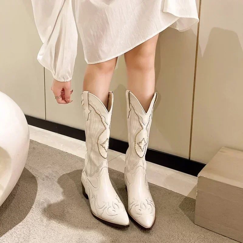 Women's vintage cowboy boot with square toe and chunky heel, embroidered, western style, with side zipper.