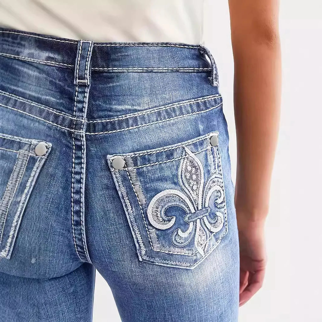 Women's straight-leg jeans, high-waisted, vintage style.