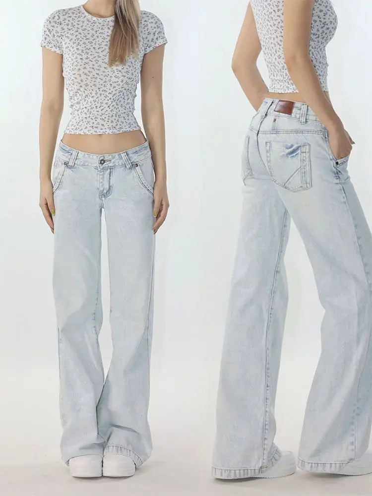 Women's casual light blue low-waisted jeans, streetwear style.
