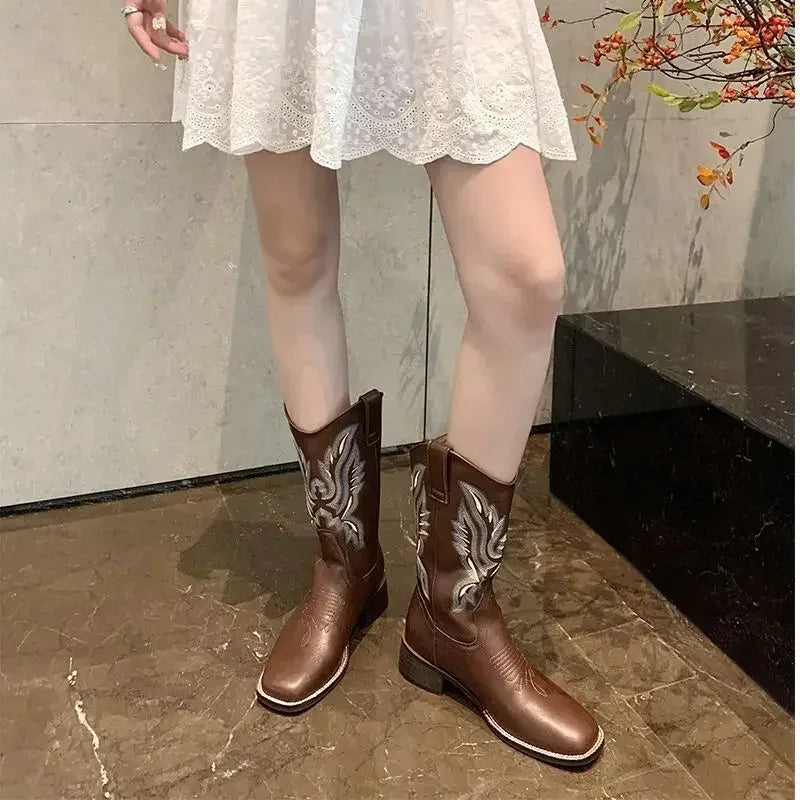 Women's retro mid-calf boots with a square toe and chunky heel.