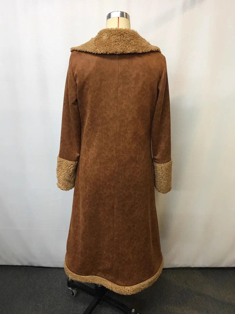 Women's vintage brown western-style denim jacket with plush lining.