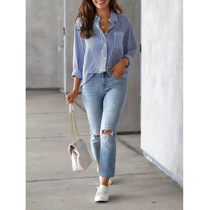 Women's classic blue striped shirt, vintage streetwear style, long sleeves, casual, loose fit, single button fastening.