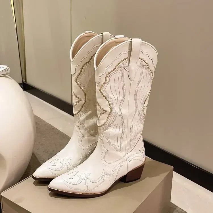 Women's vintage cowboy boot with square toe and chunky heel, embroidered, western style, with side zipper.