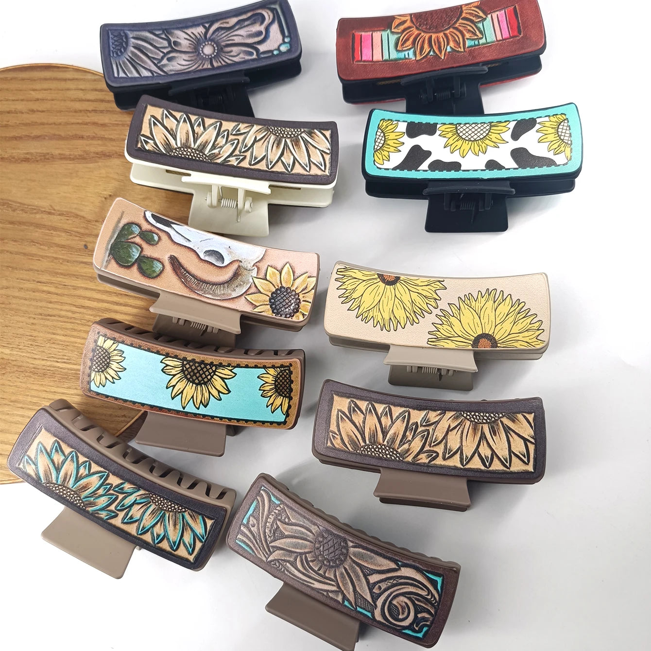 Large, cowboy-style PU leather hair clips with a sunflower print, non-slip grip.