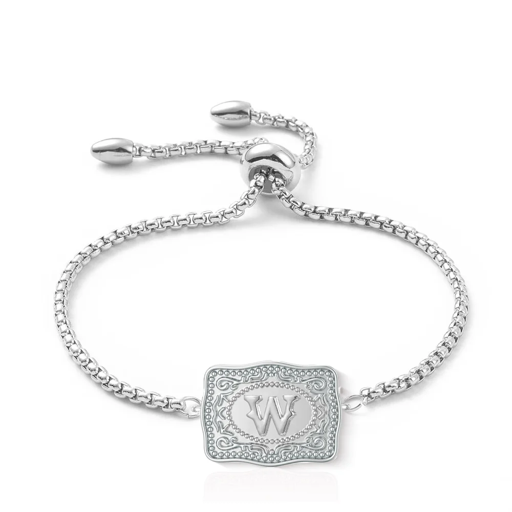 Women's bracelet with embossed gothic belt buckle and initial.