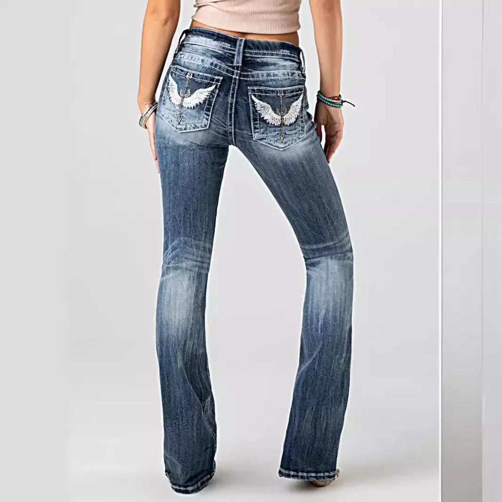 Women's jeans with embroidered pockets, distressed effect, mid-rise waist, slim fit, vintage style.