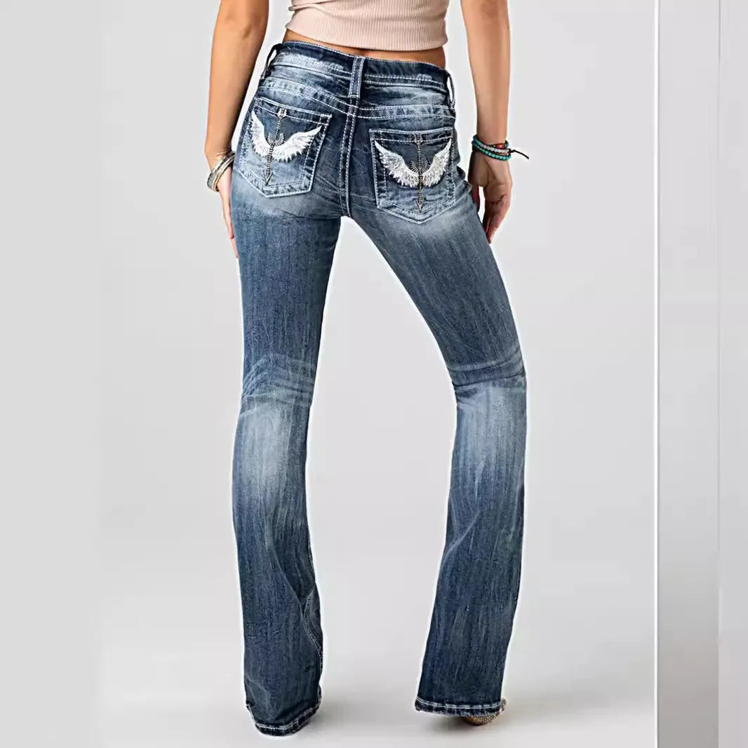 Women's jeans with embroidered pockets, distressed effect, mid-rise waist, slim fit, vintage style.