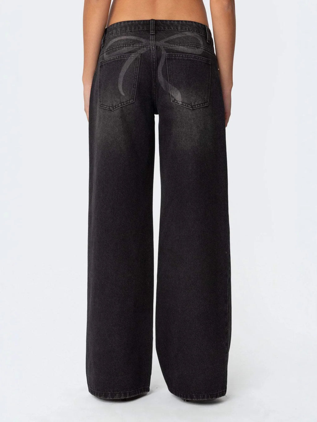 Women's wide-leg printed jeans, straight cut.