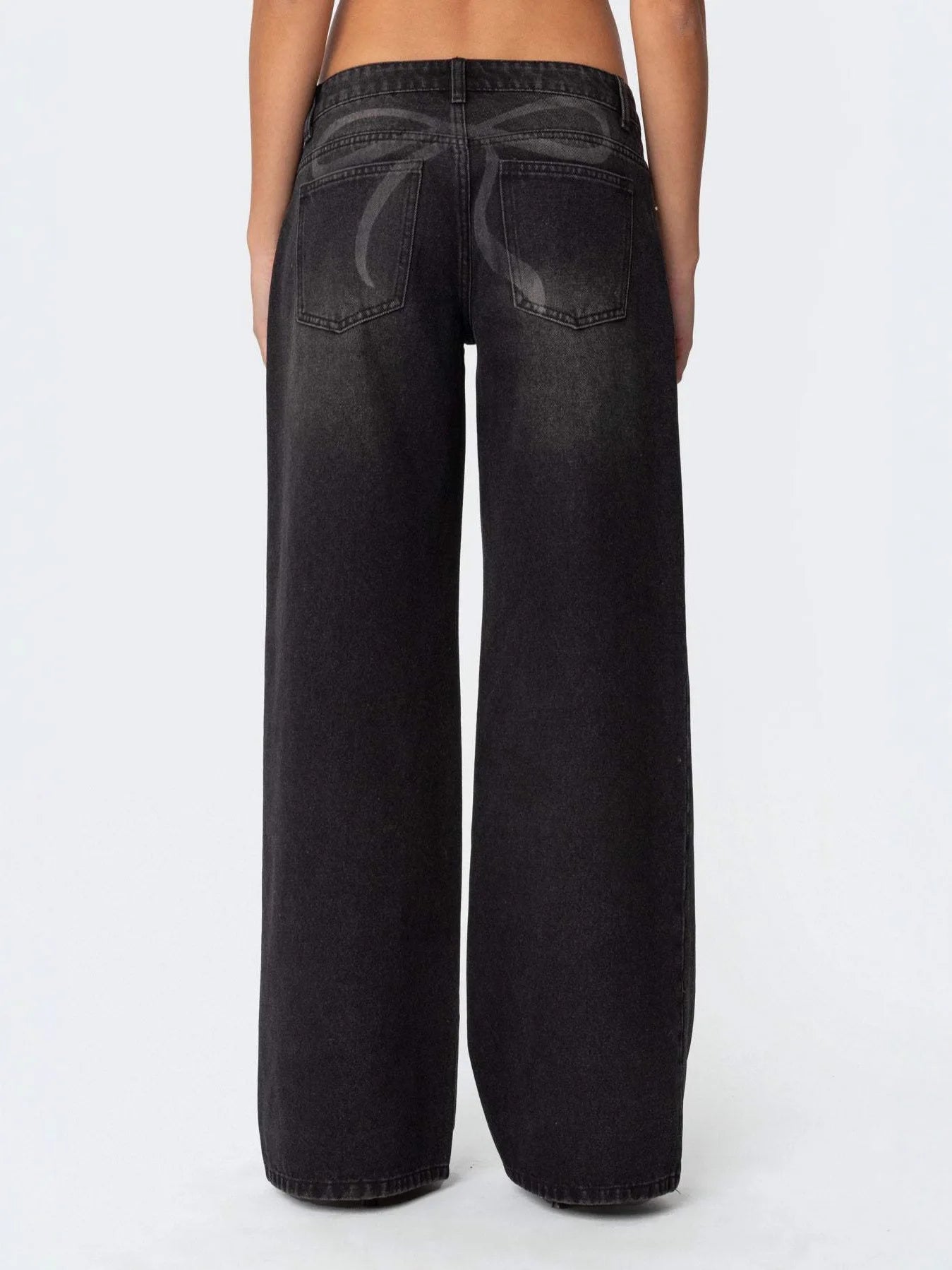 Women's wide-leg printed jeans, straight cut.