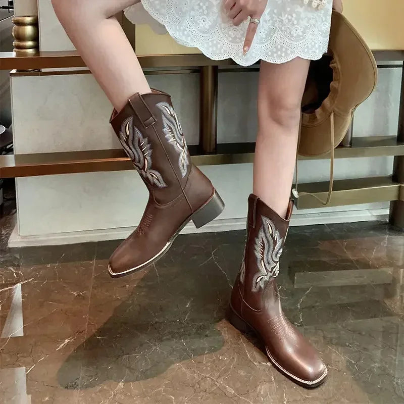 Women's retro mid-calf boots with a square toe and chunky heel.