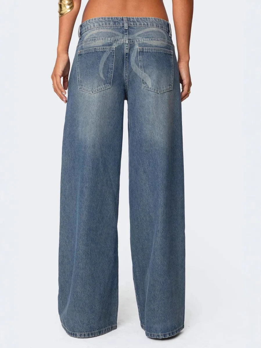 Women's wide-leg printed jeans, straight cut.