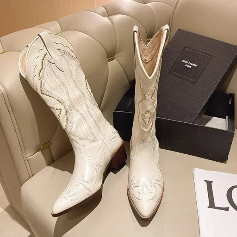 Women's vintage cowboy boot with square toe and chunky heel, embroidered, western style, with side zipper.