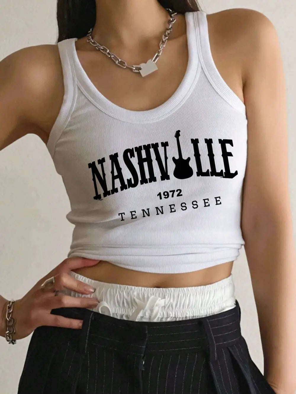 Women's summer sleeveless tank top with Nashville, Tennessee lettering print.
