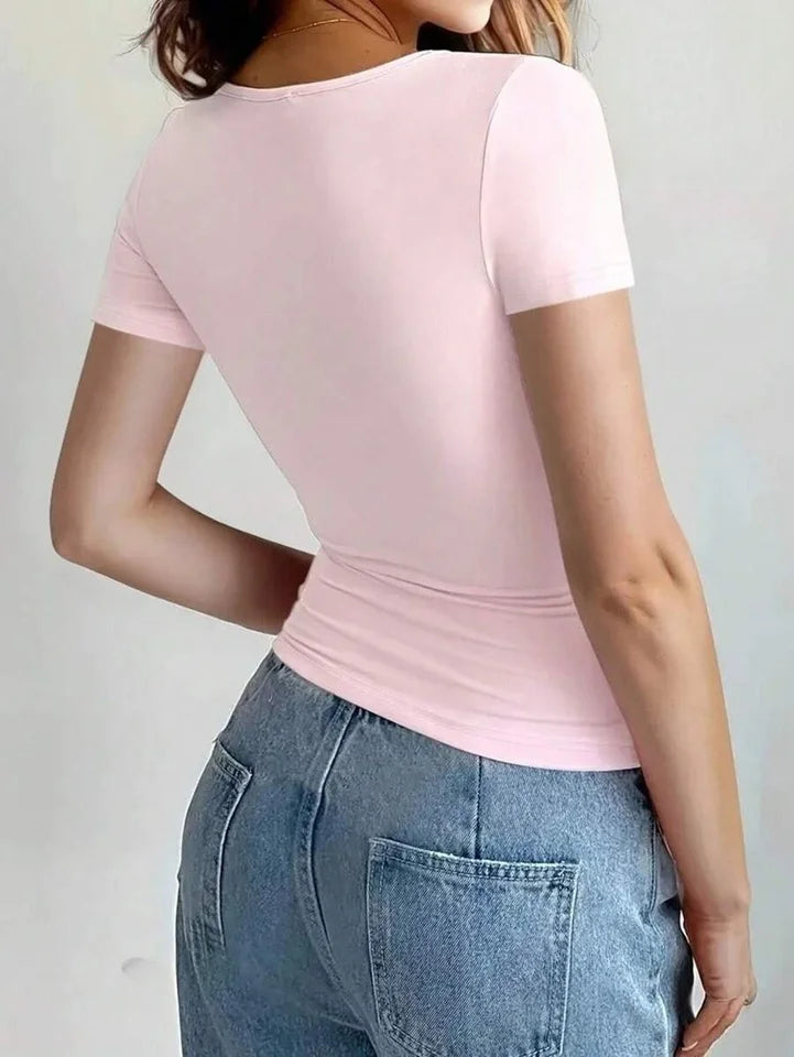 Basic casual women's blouses in the Y2K style, featuring a round neck, short sleeves, a cropped design, and a fitted, elegant silhouette.