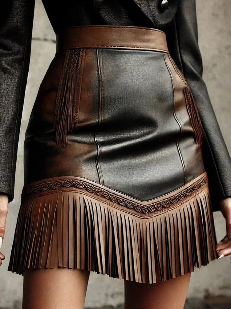 Vintage Western-style mini skirt with fringed hem, fashionable women's skirt in faux leather.